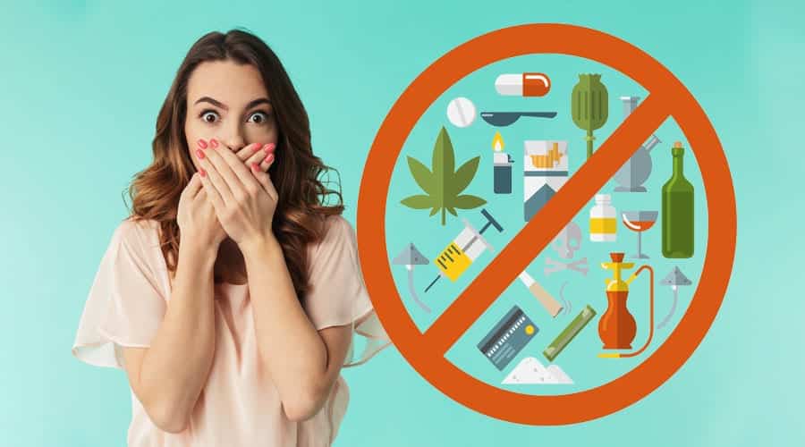 5 (Shocking) Things That Can Happen When You First Get Sober Woman is shocked by what can happen when first getting sober and holding her hands to her mouth.