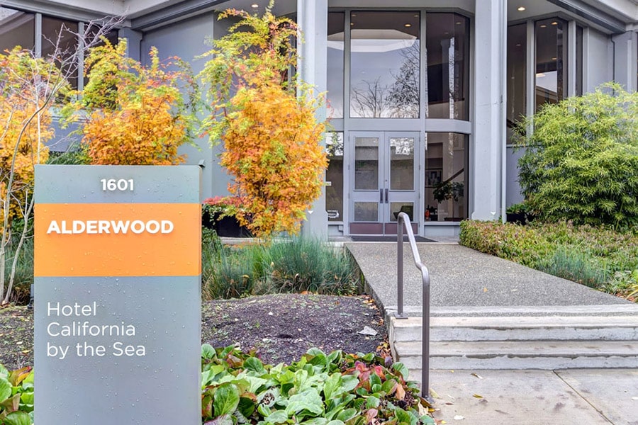 Modern rehab facility entrance with stairs and hand rails in Bellevue, Washington