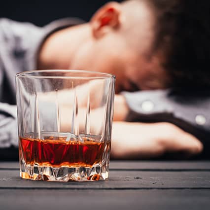 Man who wants to stop drinking passed out drunk, needs alcohol detox