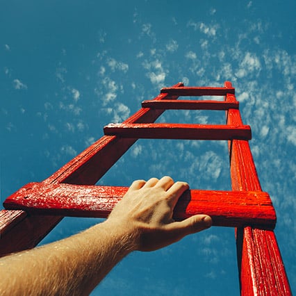 Large man hand clasping onto red ladder that climbs up into the sky