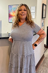 Smiling woman, professionally dressed. Amanda Calloway
Site Manager