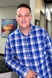 Smiling man, professionally dressed. Matthew Stull   
Admissions Specialist 