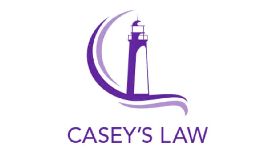 A purple print of a lighthouse, the logo for the Casey’s Law legislation movement. 