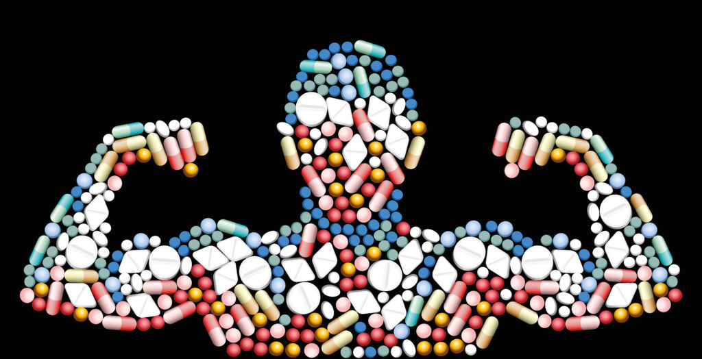 On a black background, multicolored pills are shaped into an image of a person flexing muscles to ask the question, are steroids addictive?