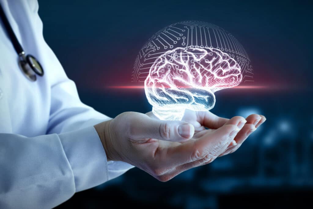 A doctor is holding a holographic image of a human brain in the palm of his hands to show how long to rewire brain from addiction.