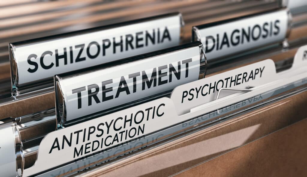 A cabinet of file folders labeled with a few labeled schizophrenia and diagnosis represent studies for clients on how Seroquel ruined their lives.