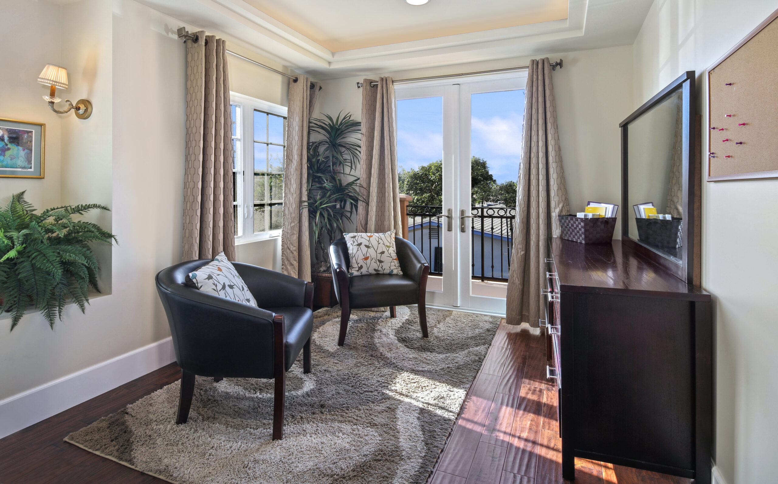 Living room with chairs and tv, an Alcohol Detox in Orange County CA