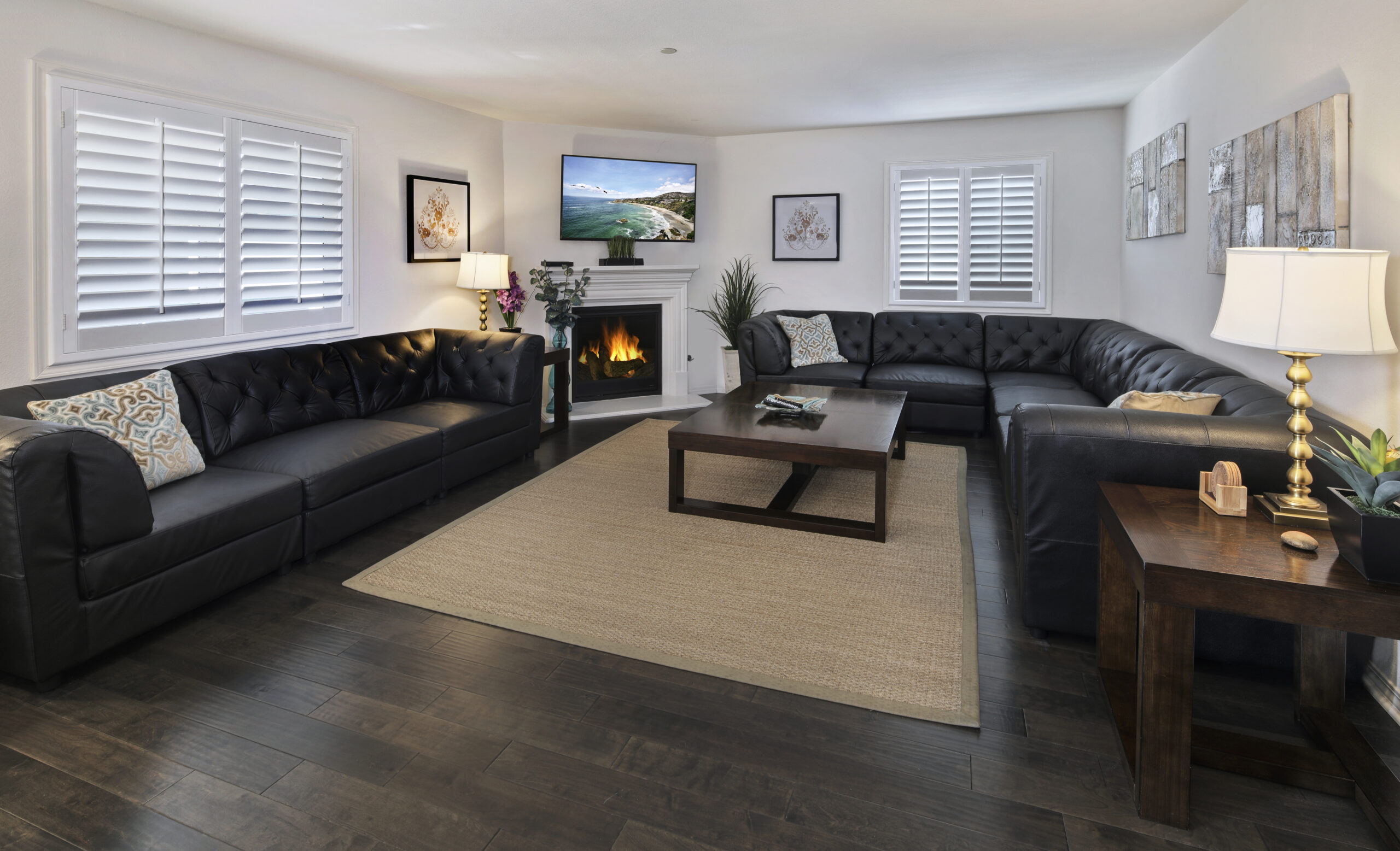 Black couch in customized drug rehab center living room