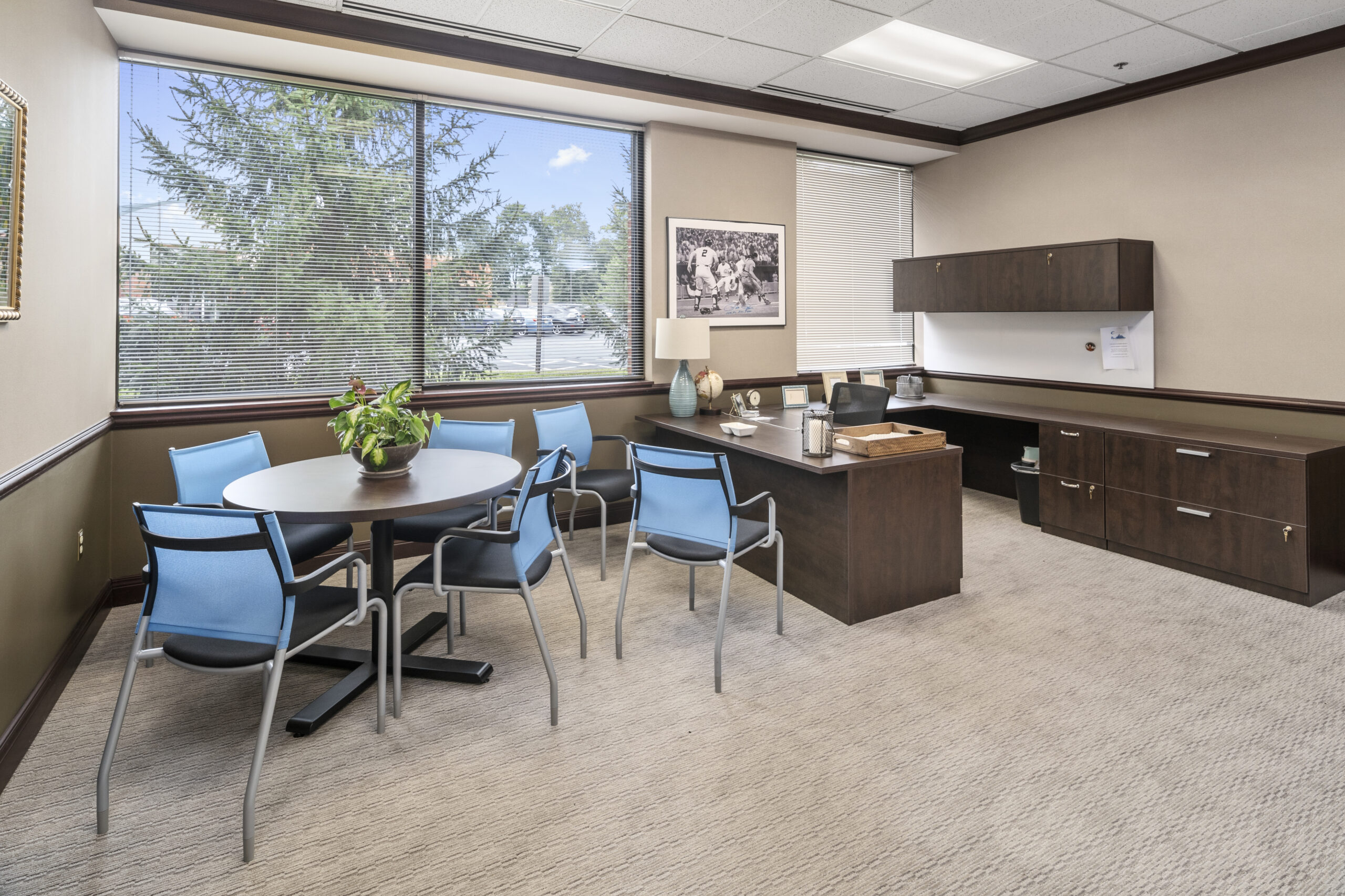 Blue chairs and brown desk in prescription amphetamine drug treatment center