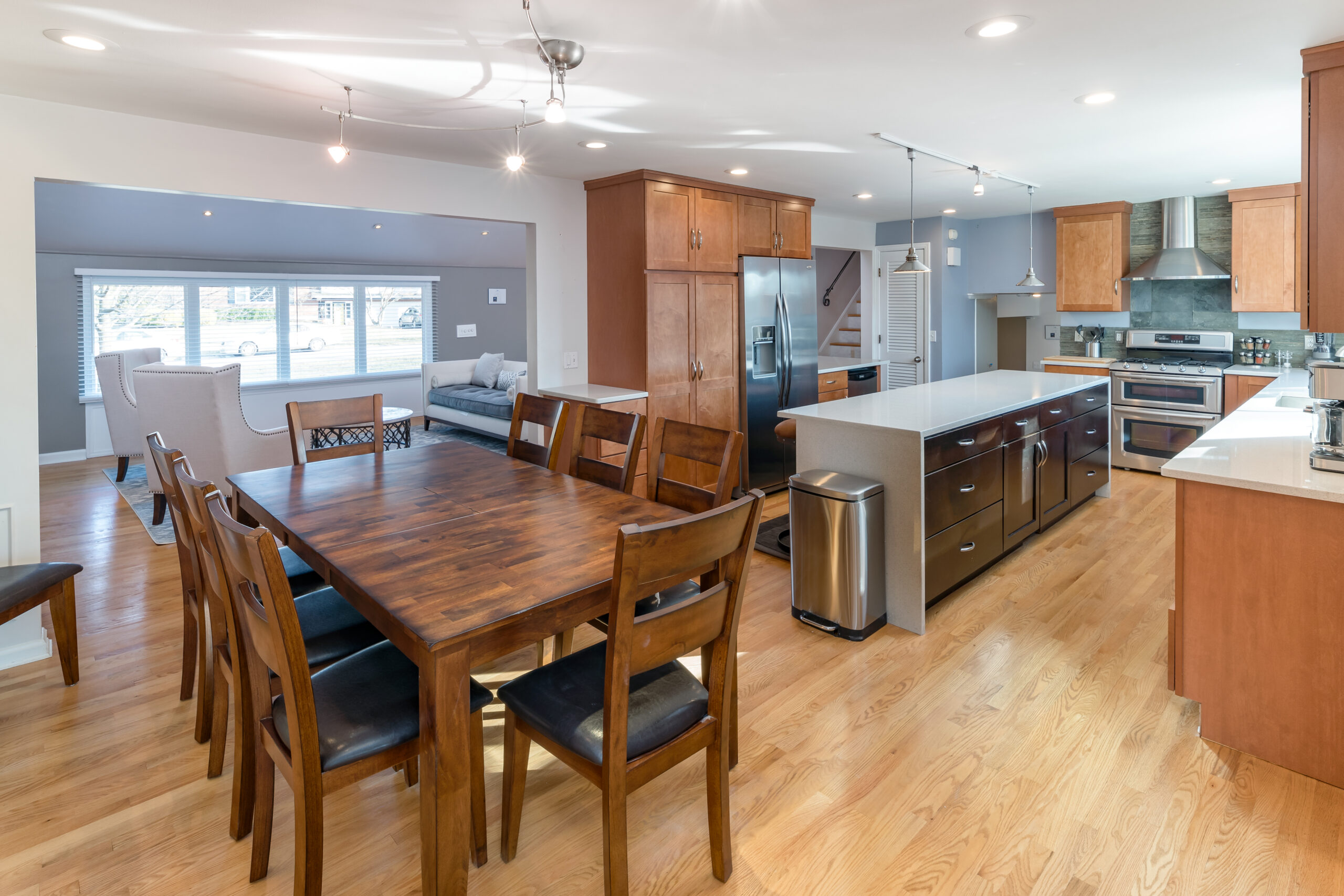 Brown kitchen with dining table set in a heroin addiction rehab 
