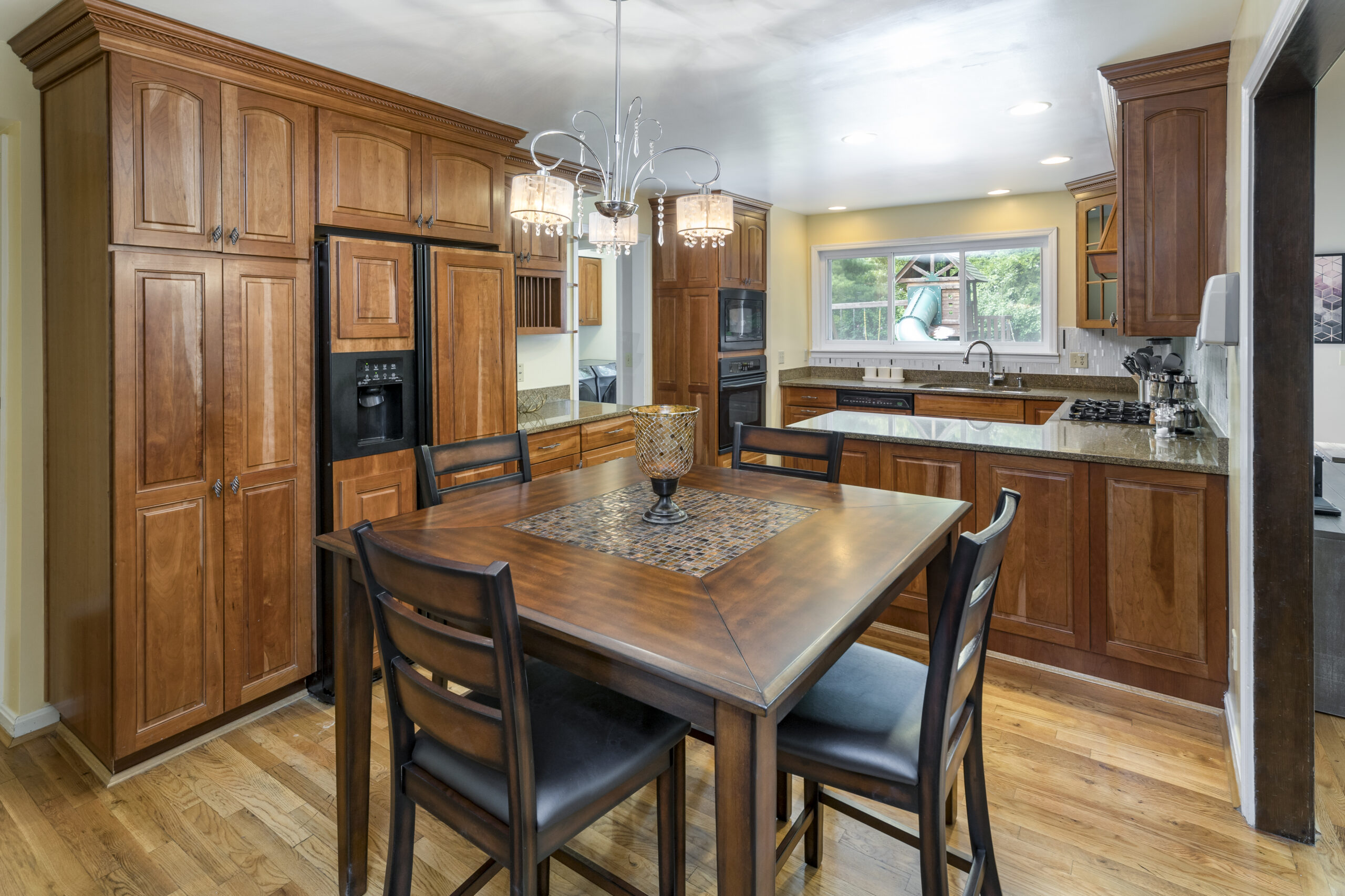 Brown cabinets and dining room table in marriage and family therapy for substance abuse facility