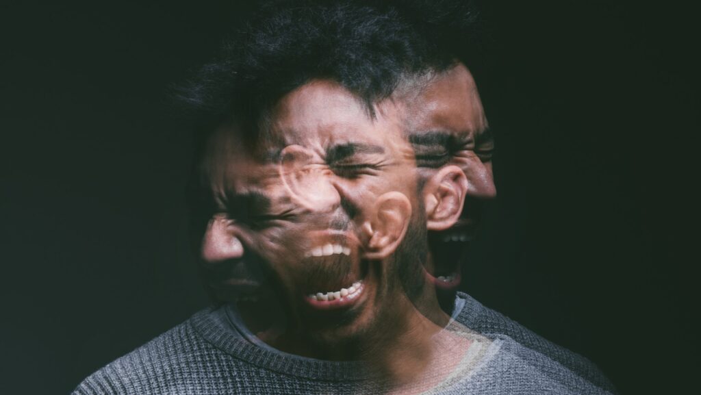 A young man experiencing drug induced schizophrenia.