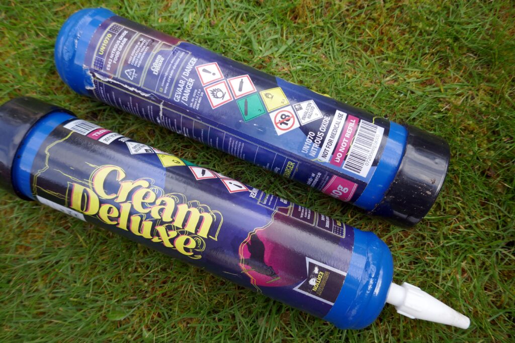 Colorful canisters of whipped cream similar to that of Galaxy Gas.
