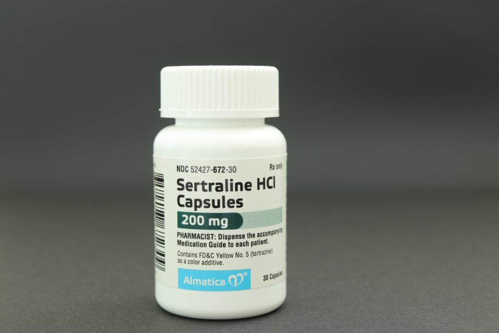 A pharmacy bottle of sertraline HCI represents the possibility to overdose on Zoloft.