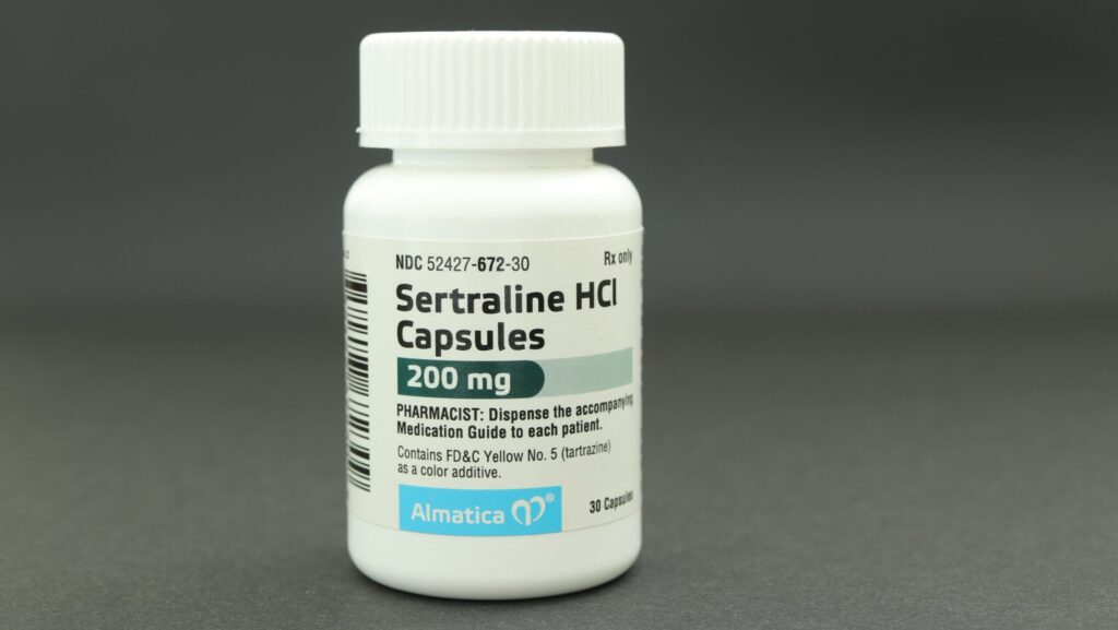 A pharmacy bottle of sertraline HCI represents the possibility to overdose on Zoloft.