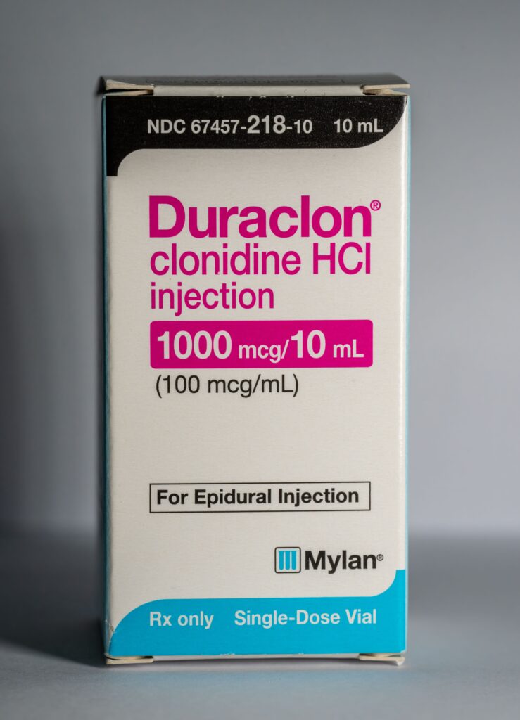 A prescription box of clonidine showing the dosage, which can determine how long clonidine lasts in your system.
