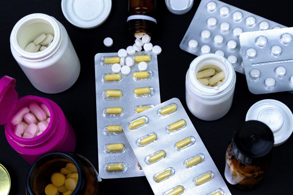 An assortment of tablets and pills that represent designer drugs.