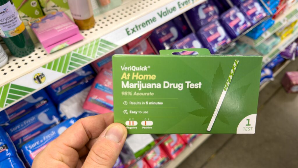 A man holding a home test quit and wondering how accurate are drug tests at home.