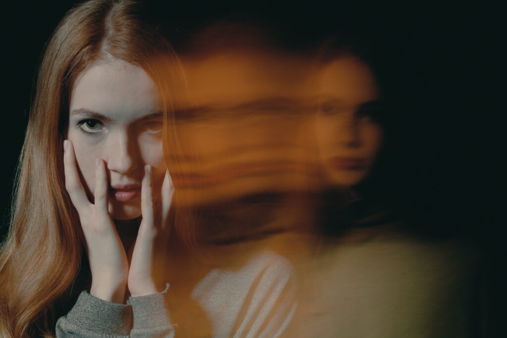 A young woman who is addicted to dissociative drugs and experiencing an out of body feeling.