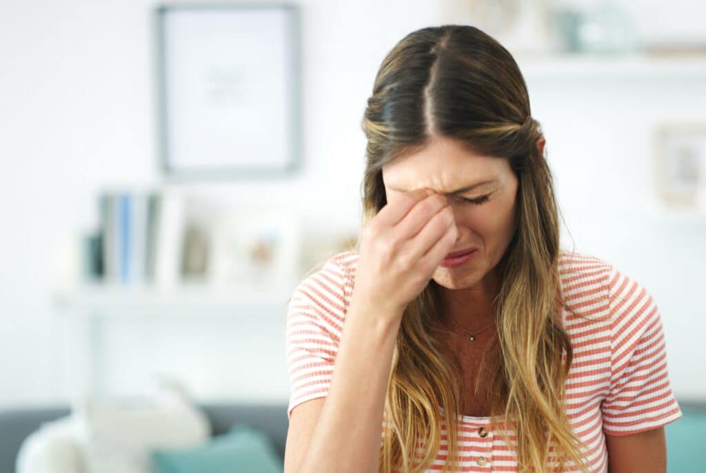 A young woman who experiences brain zaps due to her antidepressant medication.