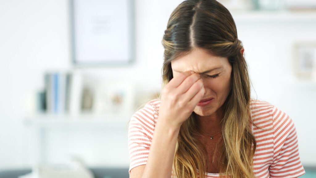 A young woman who experiences brain zaps due to her antidepressant medication.