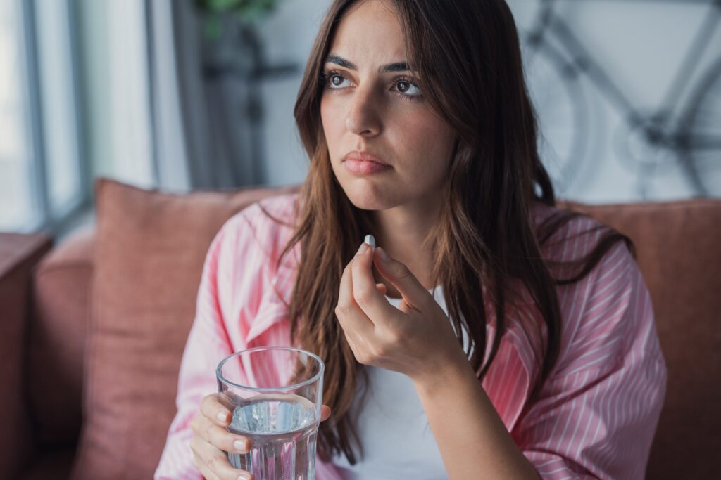 A young woman taking her antidepressant medication and wondering how to go off Lexapro when she is ready.